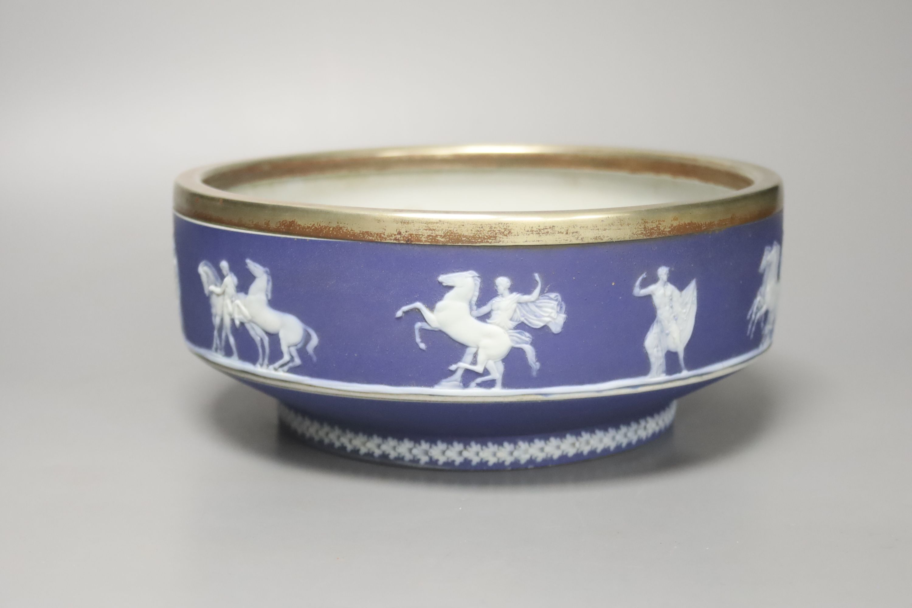 Three Beswick bird figures, a Royal Doulton Whyte & Mackay Scotch Whisky 'Merlin' figure, together with a large Wedgwood jasperware type bowl with silver plated collar